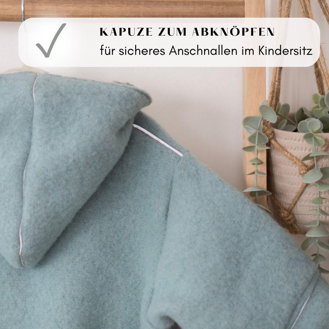Abknöpfbare Kapuze am Wollfleece-Overall – flexibel nutzbar und praktisch für jede Wetterlage