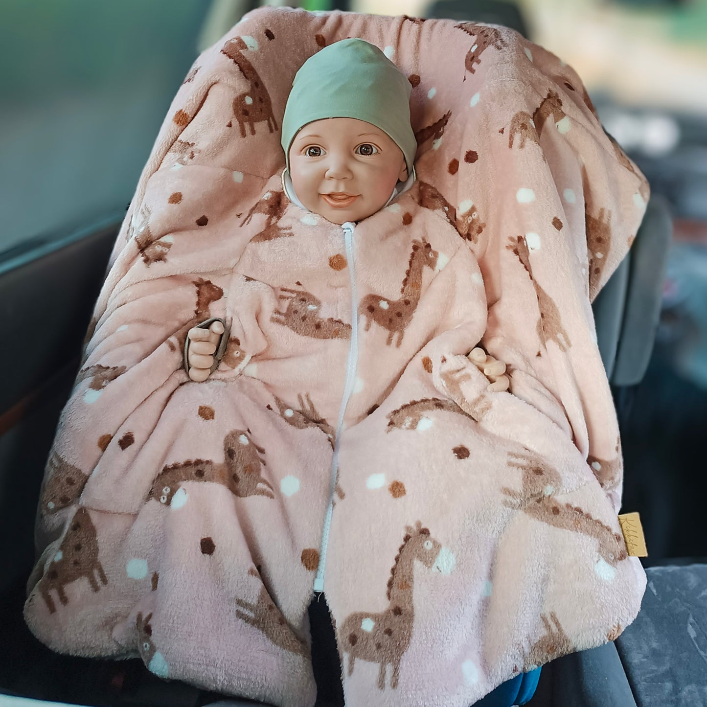 Kindersitzponcho "flauschige Giraffe rosé"