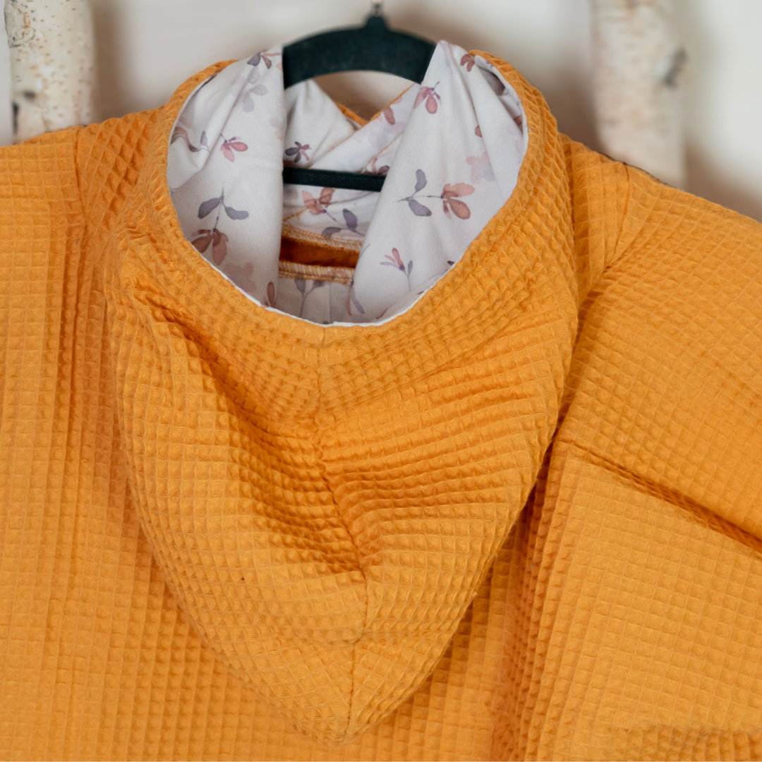 Badeponcho aus Waffelpique – Leicht, saugstark & ideal für den Sommer