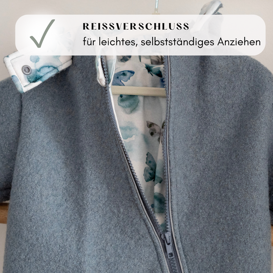 Schräger Reißverschluss am Wollwalk-Overall – einfaches An- und Ausziehen für Baby & Kleinkind
