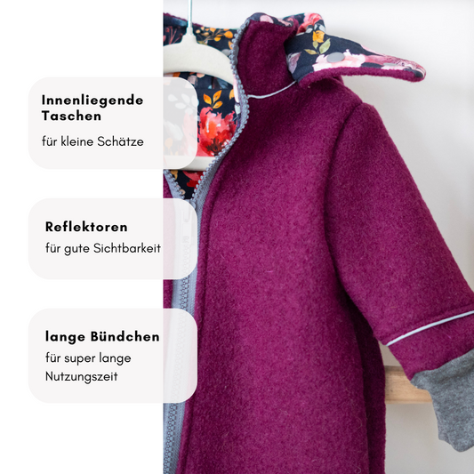 Jacke aus natürlichem Wollwalk – atmungsaktiv, abknöpfbare Kapuze & reflektierende Details