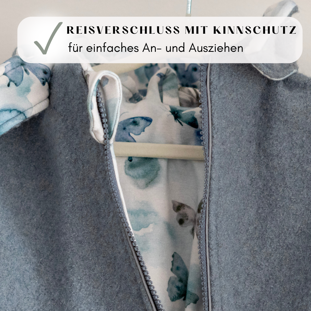 Schräger Reißverschluss am Wollwalk-Overall – einfaches An- und Ausziehen für Baby & Kleinkind