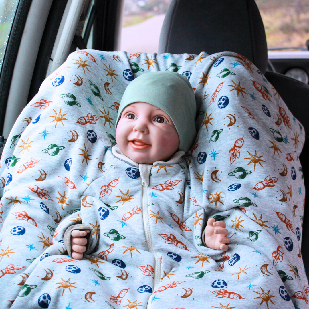 Kindersitzponcho Happy – aus reiner Baumwolle in fröhlichen Farben