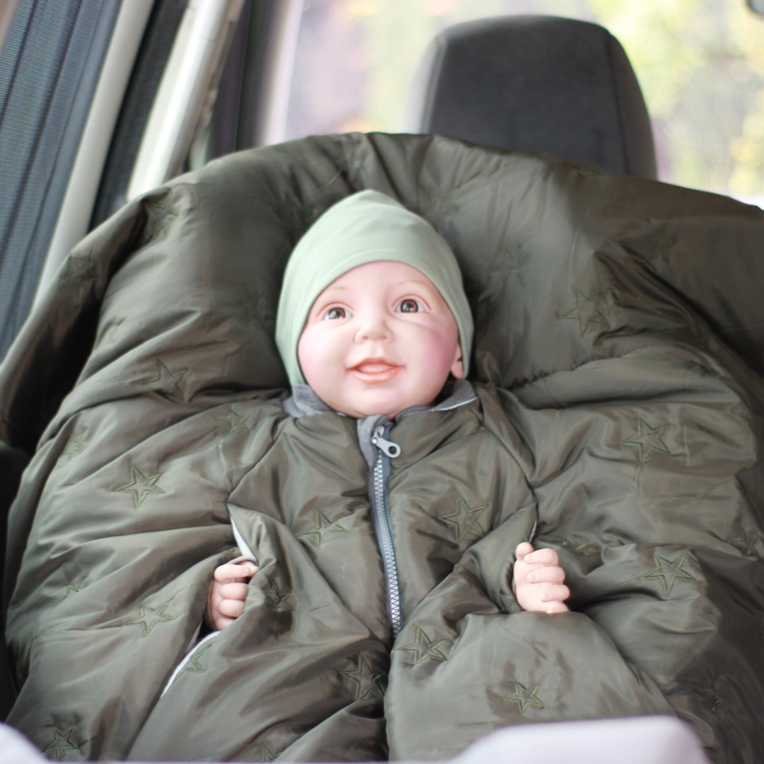 Kind im Kindersitzponcho – sicher anschnallen ohne dicke Jacke - Oliv grün