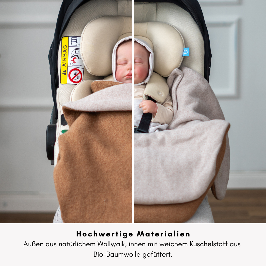 Einschlagdecke mit 5-Punkt-Gurt – geöffnet, Baby sicher angeschnallt