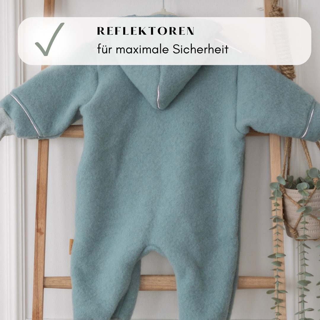 Reflektierende Details am Wollfleece-Overall – für mehr Sicherheit und Sichtbarkeit in der Dämmerung