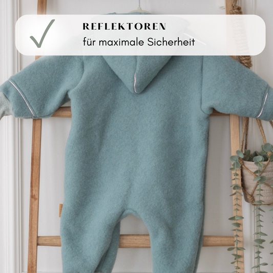 Reflektierende Details am Wollfleece-Overall – für mehr Sicherheit und Sichtbarkeit in der Dämmerung