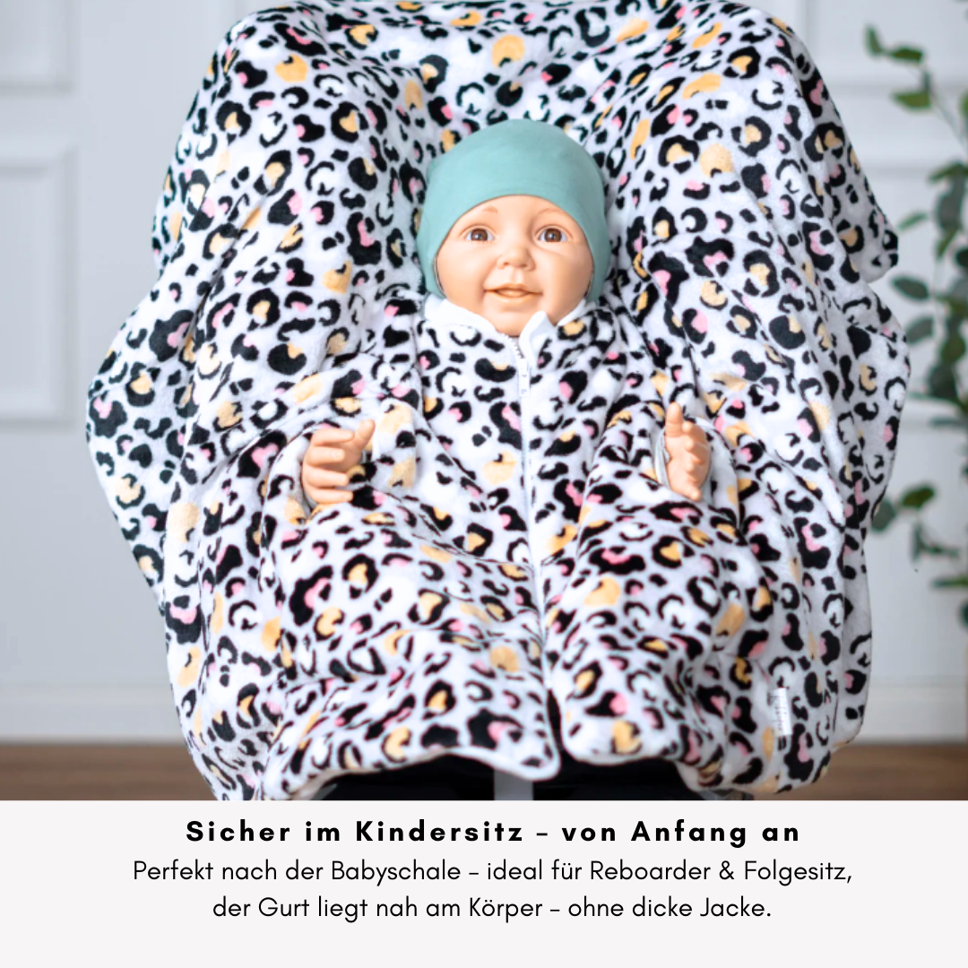 Zugeklappter Poncho – Sicherheit im Kindersitz perfekt für Reboarder bis Folgesitze