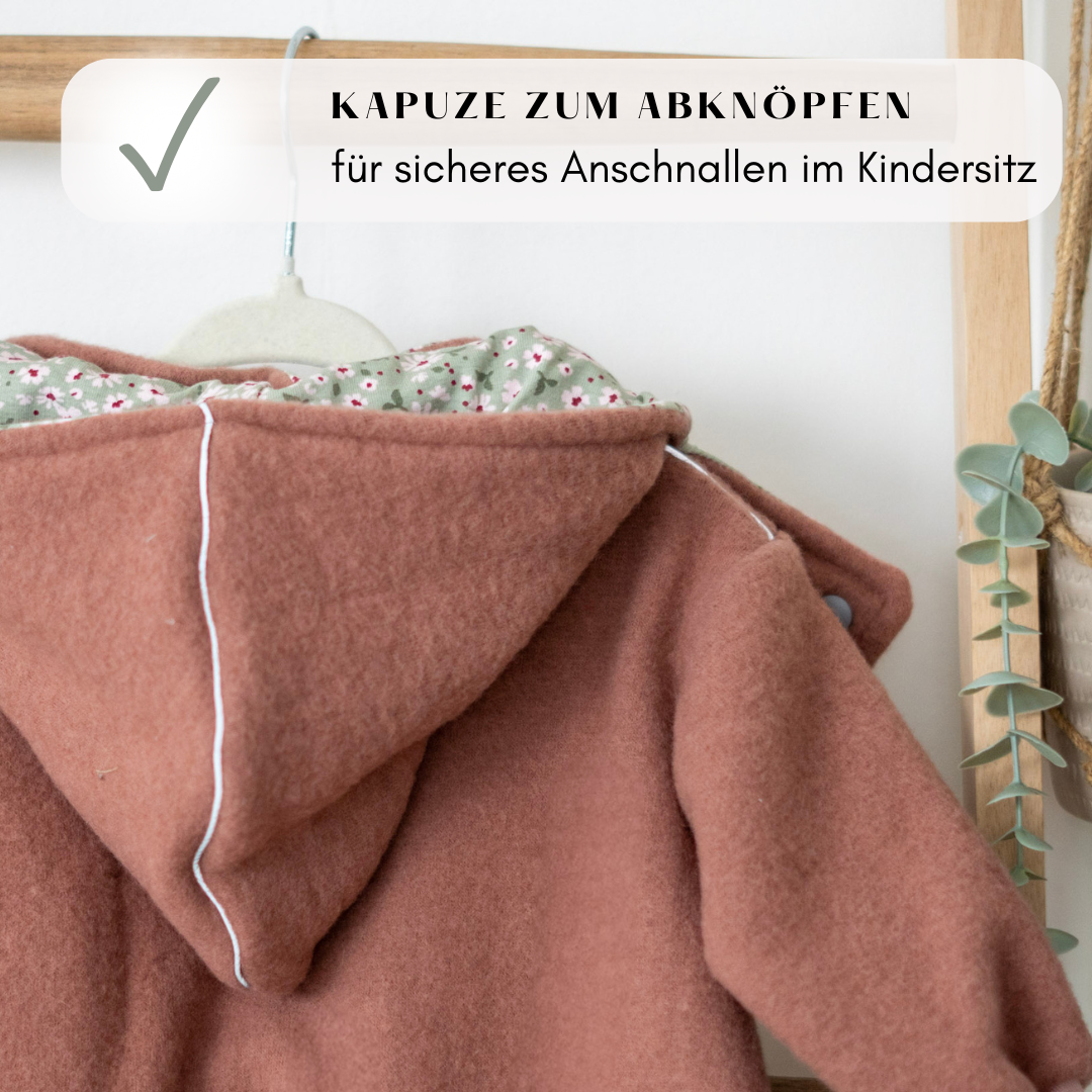 Abknöpfbare Kapuze am Wollfleece-Overall – flexibel nutzbar und praktisch für jede Wetterlage