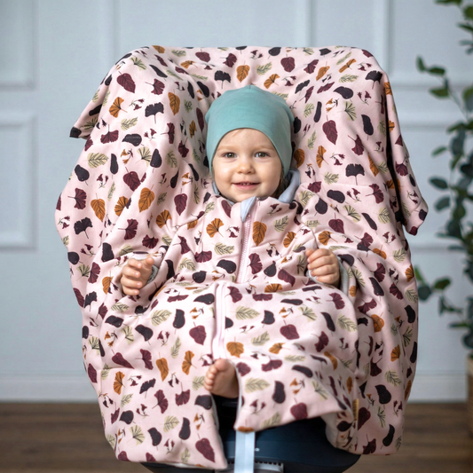 Kindersitzponcho aus Baumwolle "Blätter rosa" - warm und mitwachsend ab 6 Monaten bis 12 Jahren