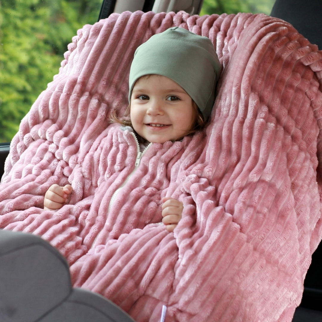 Kindersitzponcho aus Bambusfleece in Rosa - warm und mitwachsend ab 6 Monaten bis 12 Jahren