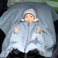 Kind im Kindersitzponcho Wollwalk – sicher anschnallen ohne dicke Jacke - Mint mit Sterne