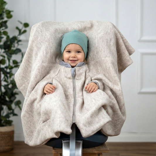 Kindersitzponcho aus Wollwalk in beige - warm und mitwachsend ab 6 Monaten bis 12 Jahren