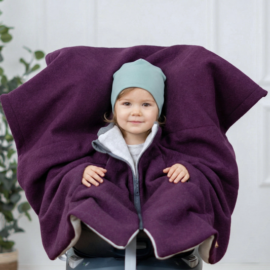 Kindersitzponcho aus Wollwalk in Lila - warm und mitwachsend ab 6 Monaten bis 12 Jahren