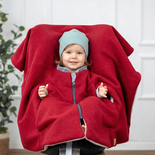 Kindersitzponcho aus Wollwalk in Rot - warm und mitwachsend ab 6 Monaten bis 12 Jahren