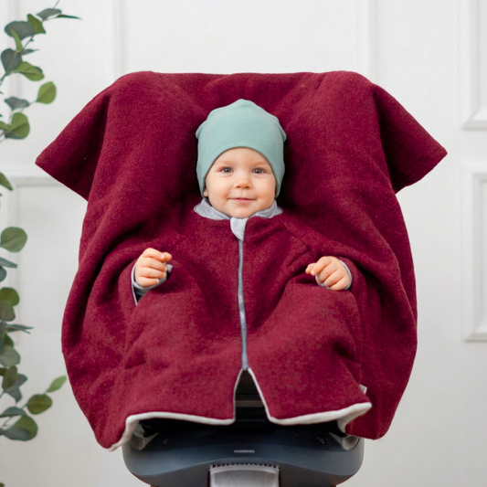 Kindersitzponcho aus Wollwalk in Brombeere - warm und mitwachsend ab 6 Monaten bis 12 Jahren