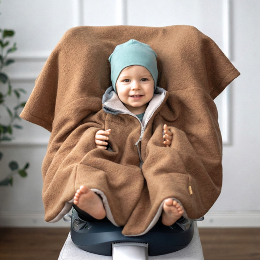 Kindersitzponcho aus Wollwalk in Caramel - warm und mitwachsend ab 6 Monaten bis 12 Jahren