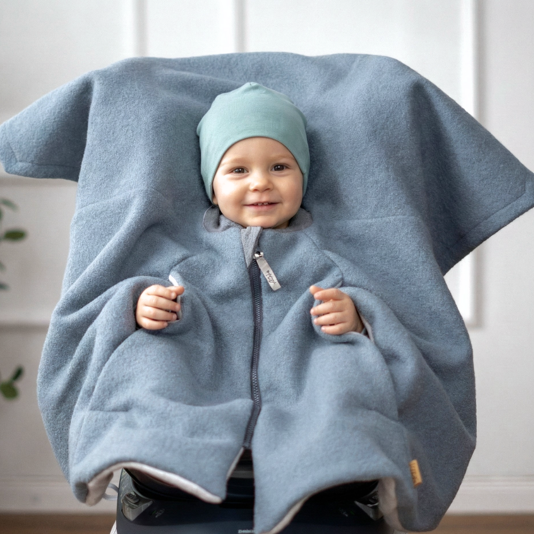 Kindersitzponcho aus Wollwalk in Mint - warm und mitwachsend ab 6 Monaten bis 12 Jahren