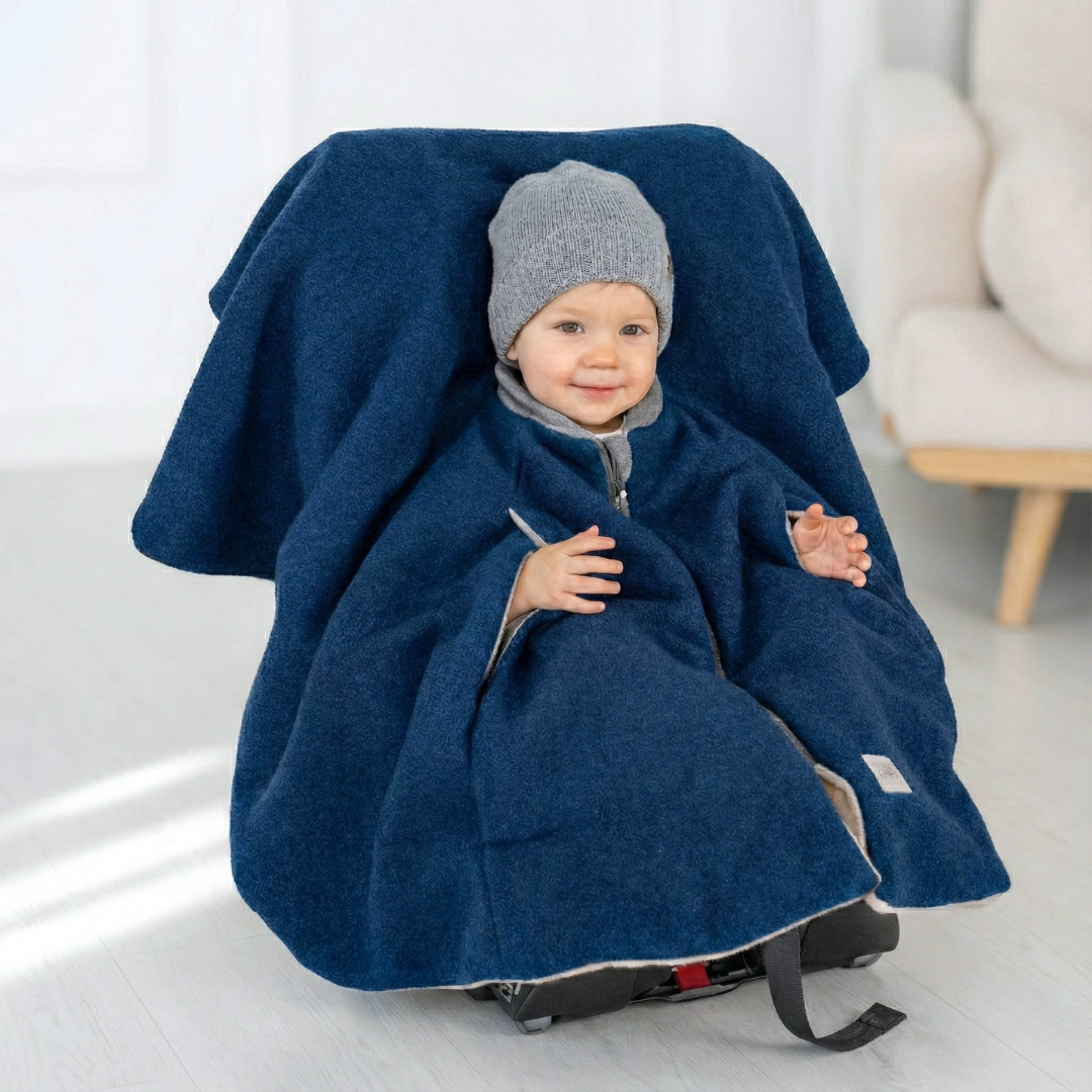 Kindersitzponcho aus Wollwalk in petrol - warm und mitwachsend ab 6 Monaten bis 12 Jahren