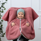 Kindersitzponcho aus Wollwalk in Rosewood - warm und mitwachsend ab 6 Monaten bis 12 Jahren