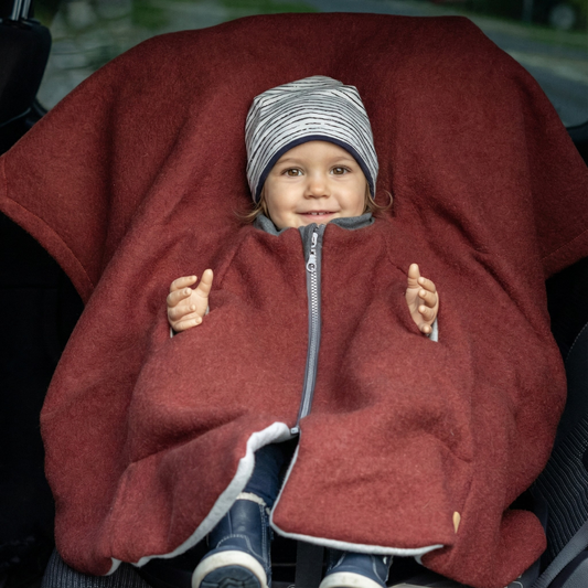 Kindersitzponcho aus Wollwalk in Terra - warm und mitwachsend ab 6 Monaten bis 12 Jahren