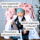 Fleece-Kindersitzponcho aufgeklappt – sicher angeschnallt ohne Jacke