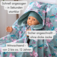 Detailaufnahme Kindersitzponcho- Softshell-Stoff – wasserabweisende Oberfläche mit Struktur