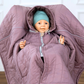 Kind im Kindersitzponcho – sicher anschnallen ohne dicke Jacke - rosa
